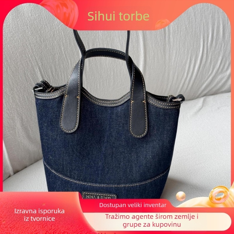 Bucket torba - urban stil jednostavnosti; Materijal: Oxford tkanina; Oblik: bucket tip; Otvaranje: magnetska kopča; Podstava: platno
