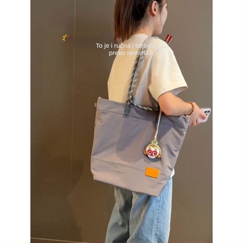 Unisex bucket torba od Oxford Canvas – vertikalni kvadratni oblik, zatvaranje zipom, unutarnja džep s zipom, poliester podstava, gradski minimalistički stil