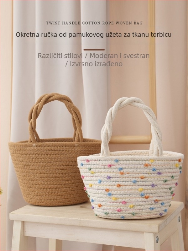 Torba od platna s vertikalnim kvadratnim oblikom i poklopcem, otvoreni gornji dio; unutarnje pretince: zatvarač, džep za telefon, džep za prijenosno računalo, džep za kameru; dvostruke naramenice; gradski minimalistički stil; proljeće 2025