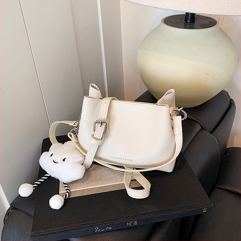 Ženska crossbody torba, gradski minimalistički stil, PU materijal, horizontalni kvadratni oblik, magnetska zatvarač, džep za telefon