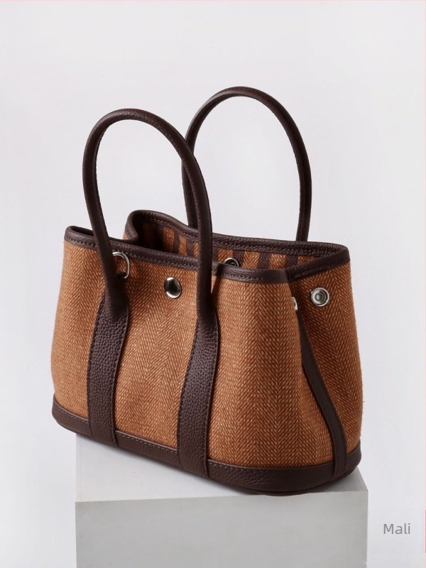 MISS SUMMER ženska torba od prave kože, bucket bag stil, prva sloj kravlje kože, poklopac, magnetsko zatvaranje