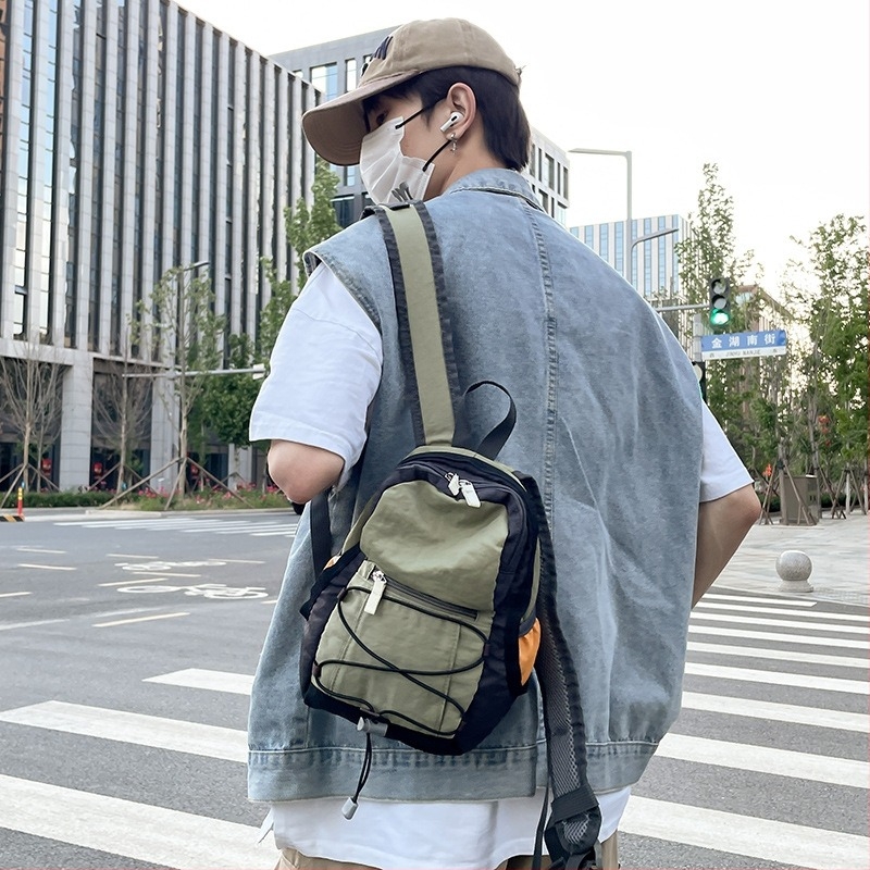 Unisex vodootporan mali ruksak za outdoor putovanja, Oxford platno, kapacitet do 20 L, kompatibilan s 10-inčnim prijenosnim računalom, lagan