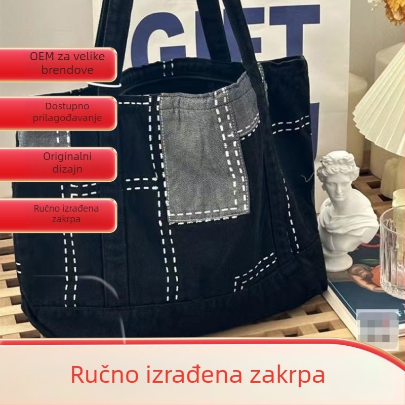 Enie ručno šivana traper torba — uspravni kvadratni oblik, zatvaranje na zip, unutarnji džepovi za telefon i identifikacijsku karticu, s unutarnjim slojem