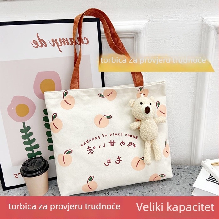 Platnena tote torba u gradskom minimalistickom stilu, horizontalan kvadratni oblik, gornje otvorenje, unutarnja kapsa za mobitel, vanjski otvoreni džep, unutarnji panel, dvostruke naramenice