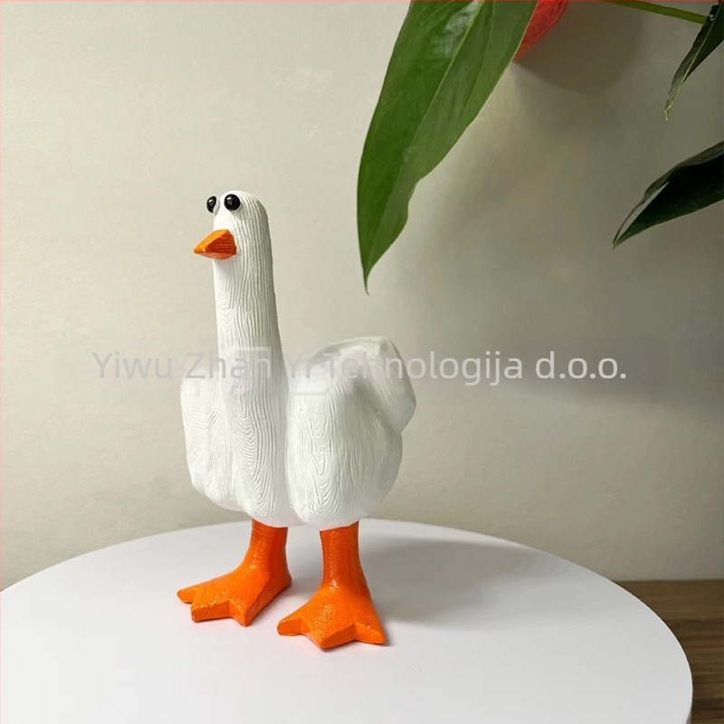 Stolna dekoracija: karikaturistička patka od smole (Materijal: sintetička smola; Stil: crtani; Kategorija: smolni rukotvorine; Značka: Exhibition Art)
