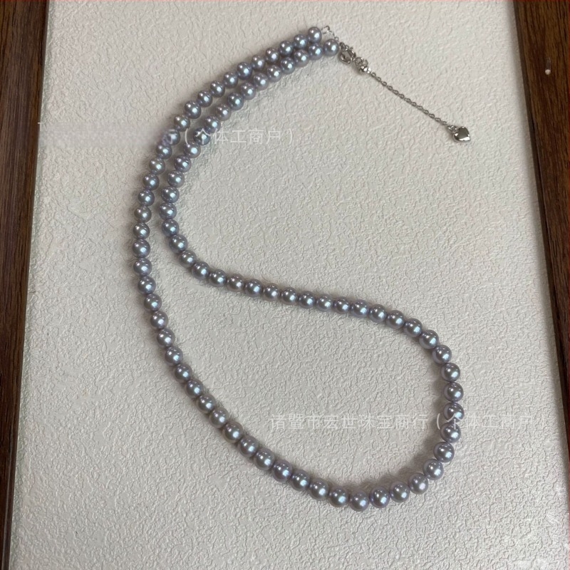 Nakit od slatkovodnih bisera, okruglog oblika, 925 srebrne komponente, duljina 45 cm, sladak stil