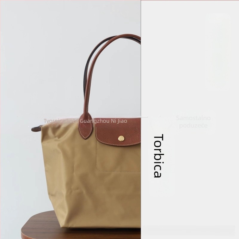 Nylon dumpling torba s poklopcem — gradski minimalistički stil, unutarnji džepovi za telefon i ID, bez naramenice