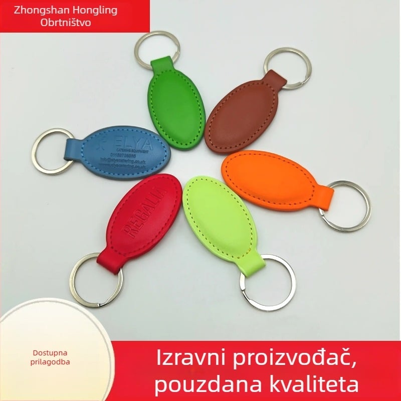 Ovalni dvostruki kožni držač ključeva – kravlja koža, moderni minimalistički stil