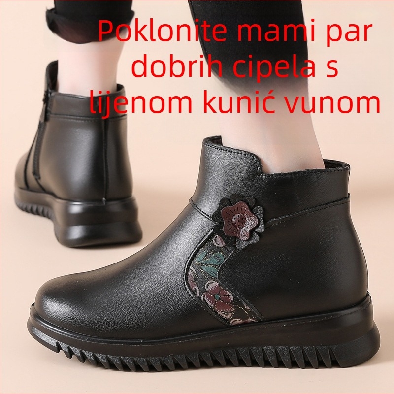 Ženske zimske čizme od kravljeg kože, unutarnji materijal ovčja koža, potplat poliuretan, bočni zatvarač, niski potpetica 1-3 cm