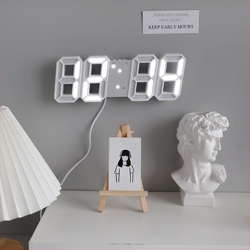 Budilnik s LED zaslonom, baterijsko napajanje, elektronički mehanizam, plastično kućište, suvremen minimalistički stil.