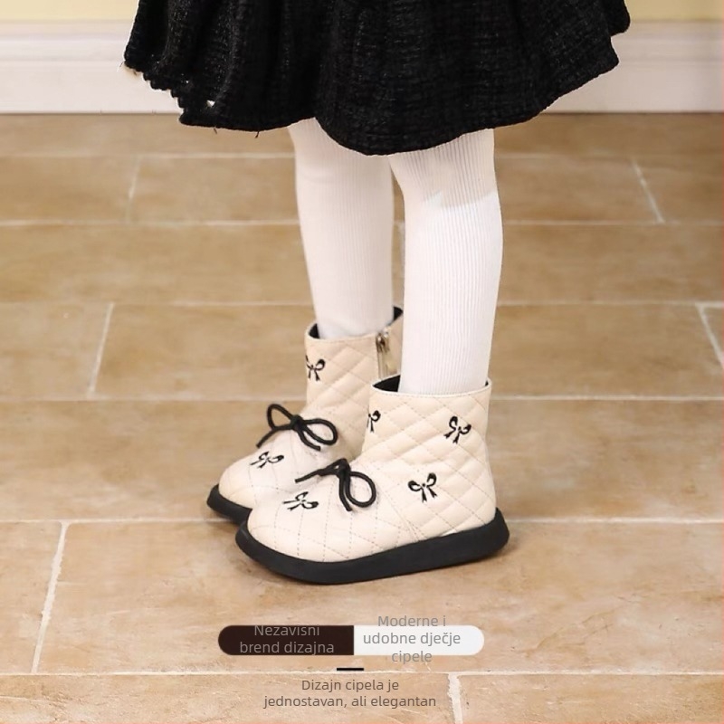 Tip proizvoda: Canyze dječje Martin čizme — princeza stil s mašnicom, bočni zip; gornji materijal: mikrovlakna koža; ulošak: prirodna koža; potplat: guma; niski kroj