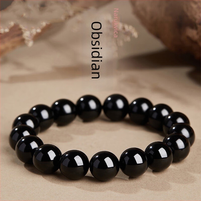 Narukvica od obsidijana, unisex stil, prirodni stil, geometrijski oblik (Materijal: obsidijan; Obrada: brušenje i poliranje; Stil: unisex; Oblik: geometrijski; Kategorija: ručni ukras)