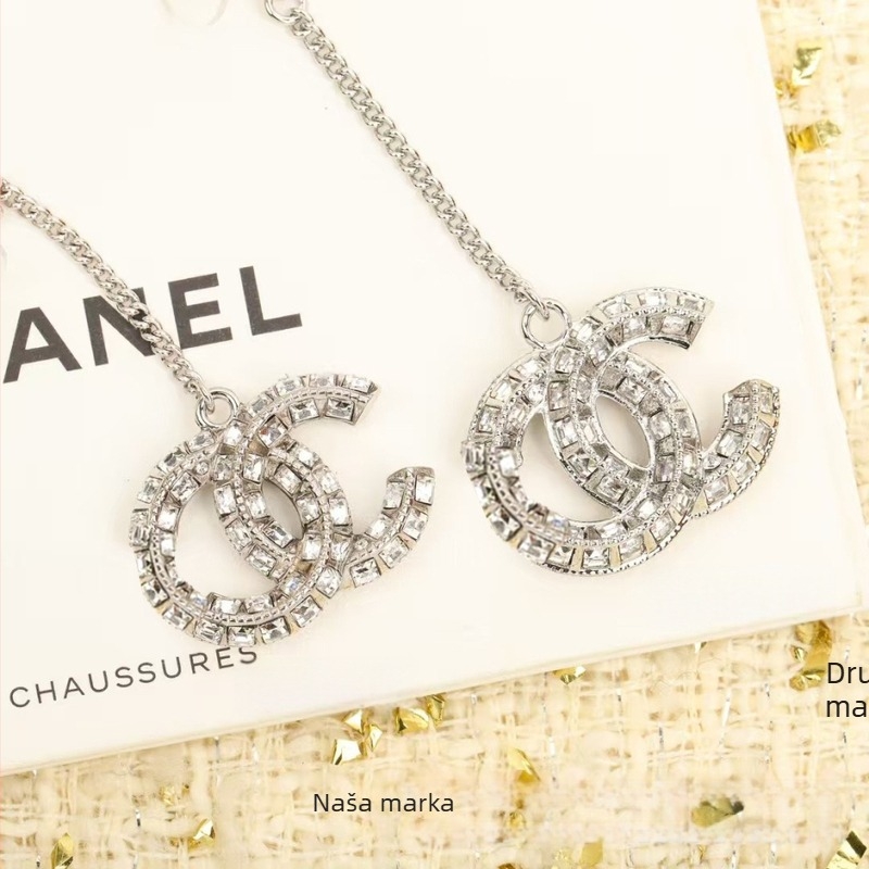 Naušnice od bakra stekstom u obliku slova/broja, dijamantnom ugradnjom, vilinski stil, za žene