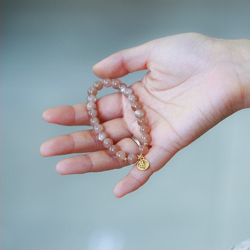 Narukvica sa sunčevim kamenom, bakreno pozlaćena, ručno pletena, model YGSL11-01