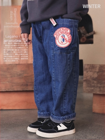 Dječje traperice s flis podstavom, dizajn karikatura i slova, srednji struk, zima 2025