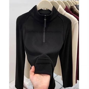 Pulover s polu-zipom i stojećim ovratnikom, dvostruki velur, dugi rukavi; poliester/elastan (90-95% poliester, 30-50% elastan); standardna kroj