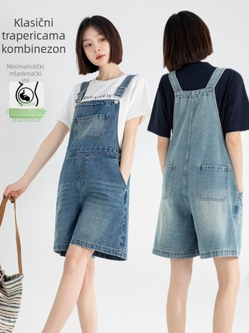 Trudnički denim kombinezon, korejski stil, slobodan kroj, hlače s pet duljina, pamuk 70–80%, ljeto 2025