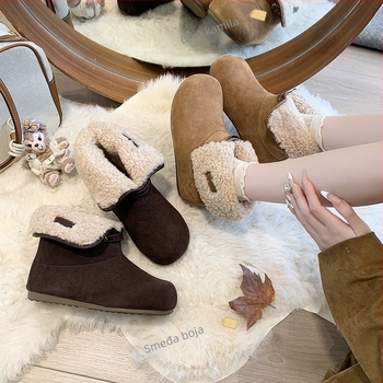 Ženske zimske čizme, gornji dio od suedea, unutrašnjost od umjetnog pliša, niski kroj, gumena potplata