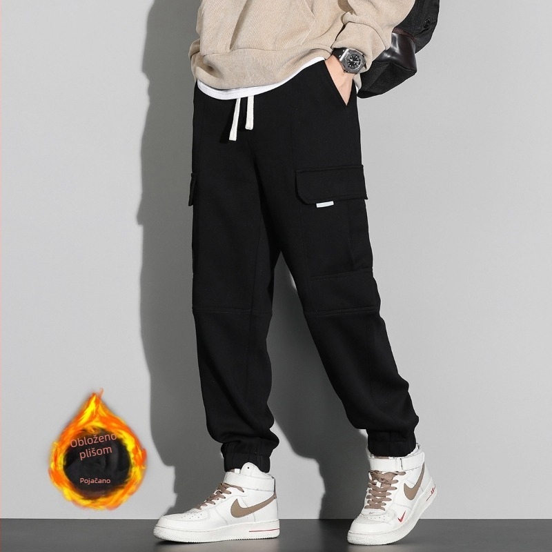 Muške duge sportske hlače s fleece podstavom, opuštenog ravnog kroja, struk s vrpcom za vezivanje, materijal 60% pamuk, 40% poliester, zimsko