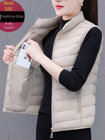 Ženska vesta od poliester materijala, uski kroj, stojeći ovratnik, zatvarač, punjenje poliester-pamuk