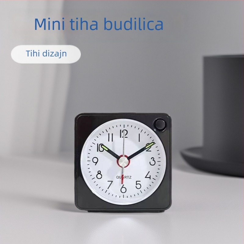 emoyo budilica – baterijsko napajanje, kvarcni mehanizam, analogni prikaz s numeričkim oznakama, svijetli u mraku, PVC brojčanik