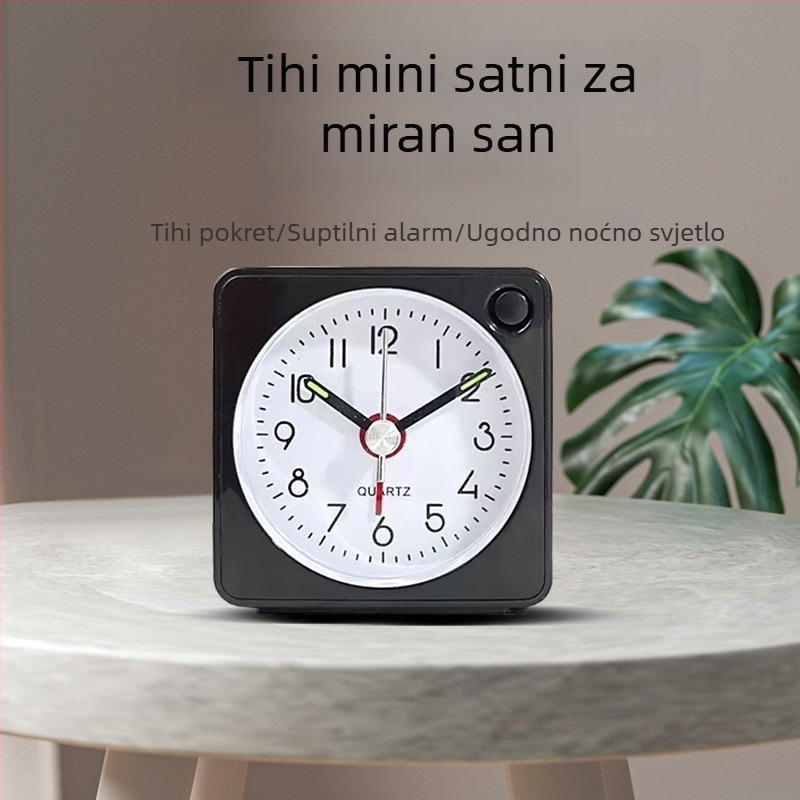 emoyo budilica – baterijsko napajanje, kvarcni mehanizam, analogni prikaz s numeričkim oznakama, svijetli u mraku, PVC brojčanik
