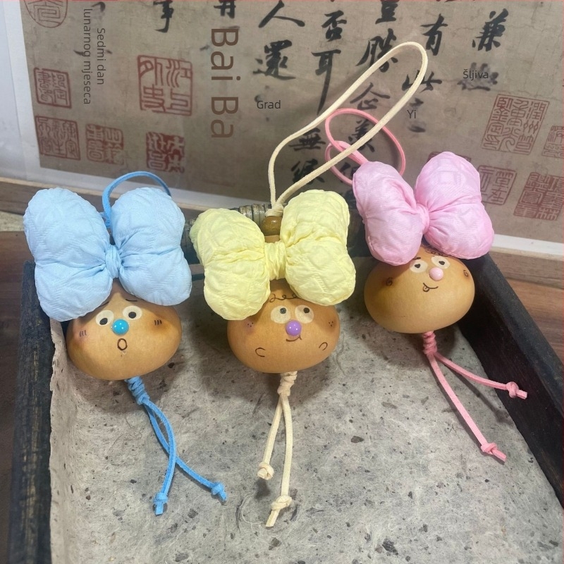 Kljucni lančić u obliku tikve, ručna izrada, originalni dizajn, jesensko izdanje 2025