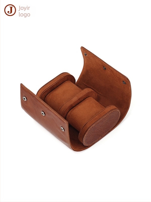 Kutija za satove od prave teleće kože, ručno izrađena, prijenosna za putovanja; otporna na prašinu i vibracije. Specifikacije: Pakiranje: 1 kom.; Podrijetlo: Guangzhou; Tisak loga: Da; Prilagodba: Da; Licencirana privatna oznaka: Da.