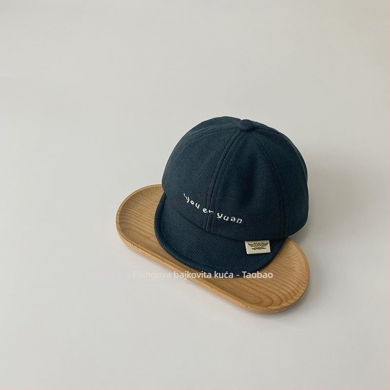 Bejbi kapa od pamuka s kupolastim oblikom i kratkim vizorom, topla i otporna na vjetar za uzrast 1–2 godine, zimski model 2024