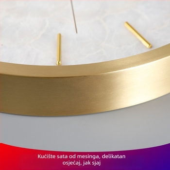 Zidni sat — okruglog oblika, mjedeno kućište, brojčanik od školjke, kvarcni mehanizam, napajan baterijom