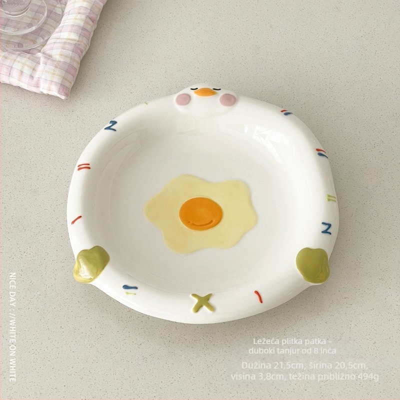 Porcelanski desertni tanjur s reljefom, nepravilnog oblika, dekor pod glazurom s karikatur uzorkom, pogodan za mikrovalnu