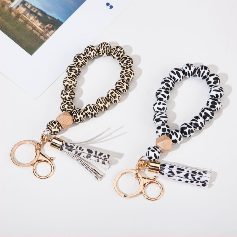 Kljucni lanac na narukvici od silikona s PU resicama – leopard uzorak, dekorativni dodatak (Materijal: Silikon; Stil: Prirodno, Ženski; Ispis logotipa: Moguće; Oblik: Drugo; Funkcija: Dekoracija)