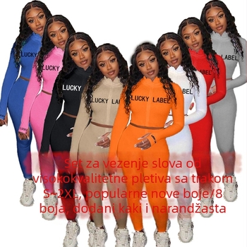 Ženski dvodijelni komplet: gornji dio s visokim ovratnikom, šav s literama i zatvaračem, dugi rukavi; uske hlače; poliester 71-80%