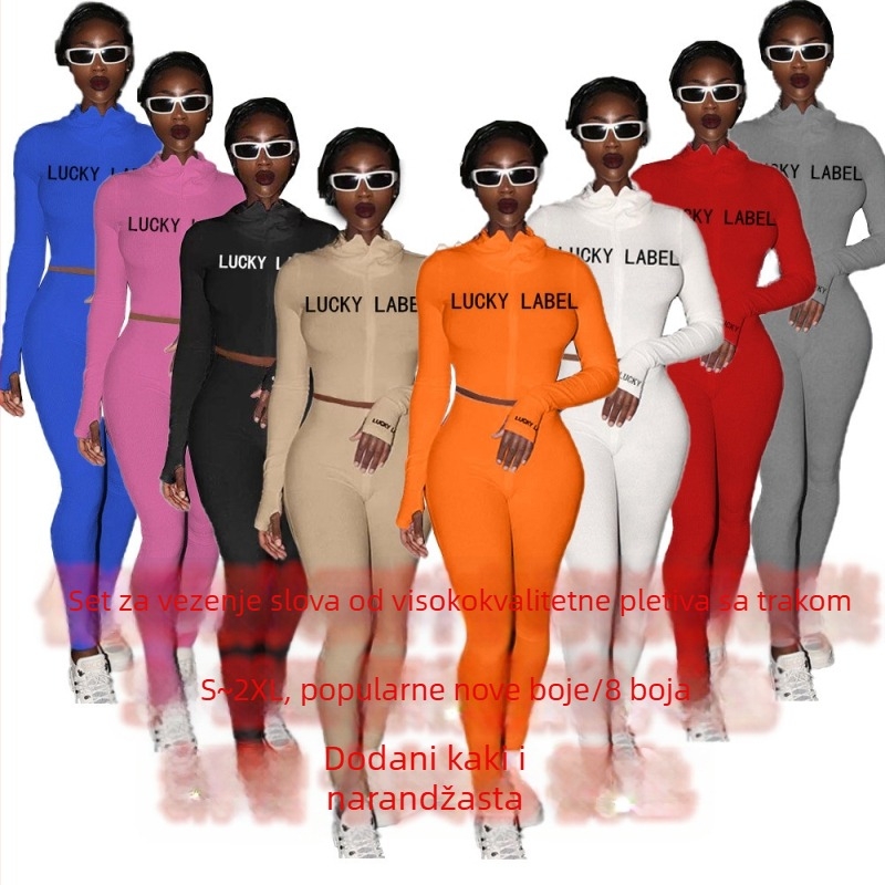 Ženski dvodijelni komplet: gornji dio s visokim ovratnikom, šav s literama i zatvaračem, dugi rukavi; uske hlače; poliester 71-80%