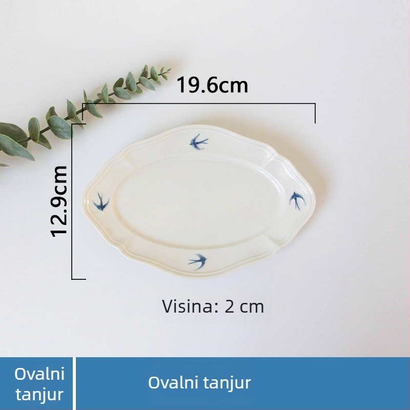 Porcelanski tanjur s reljefom lastavice – nepravilnog oblika, moderan minimalistički stil, pogodan za mikrovalnu pećnicu
