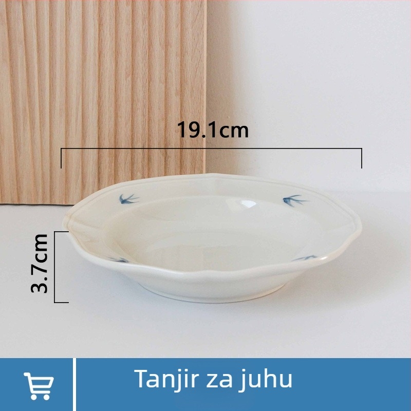 Porcelanski tanjur s reljefom lastavice – nepravilnog oblika, moderan minimalistički stil, pogodan za mikrovalnu pećnicu
