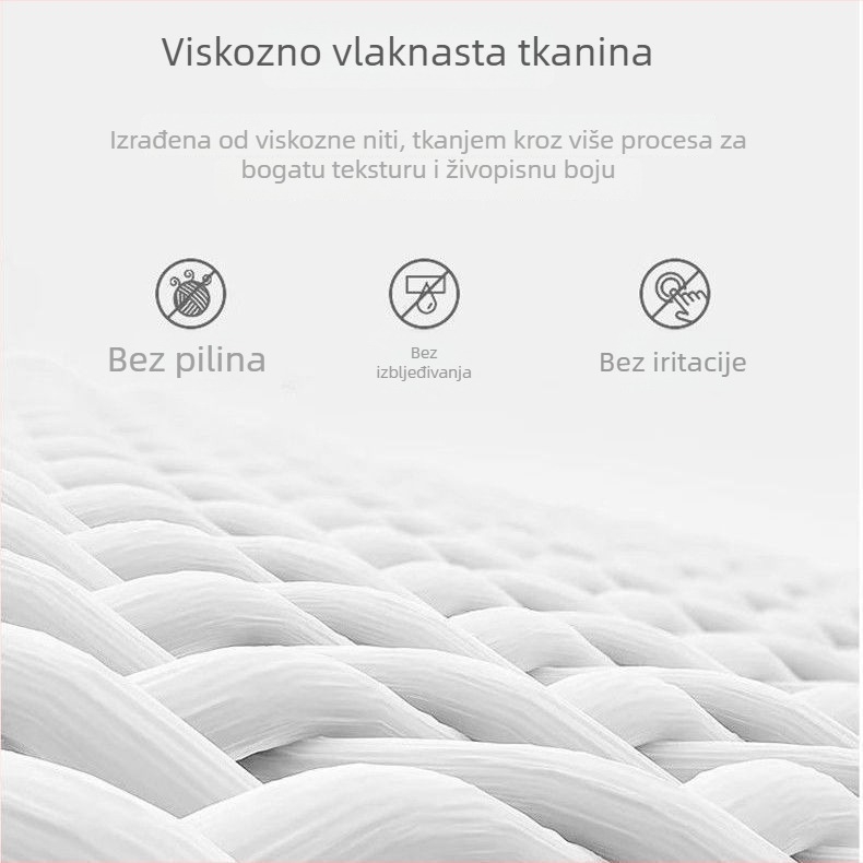 Oversize top bez rukava s poluvratnim ovratnikom i izvezen na glatkoj tkanini, proljeće 2025