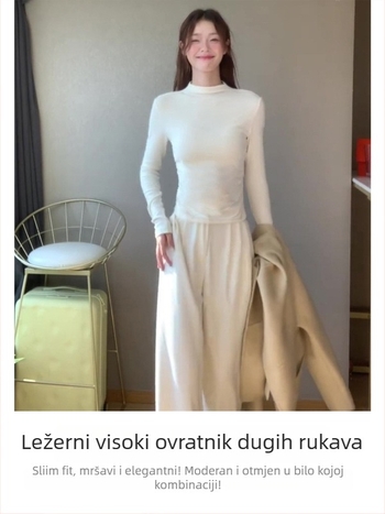 Bijeli ženski top s flis podstavom, uski kroj, dugi rukavi, polu-visoki ovratnik