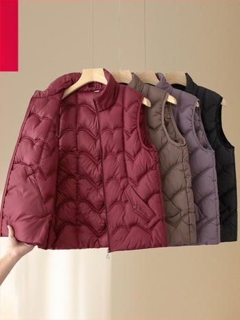 Ženska zimska vest s izolacijom od puh-pamučnog, glavni materijal poliester (>95%), duljina 50–65 cm, bez ovratnika, otporna na glačanje, casual elegantan stil