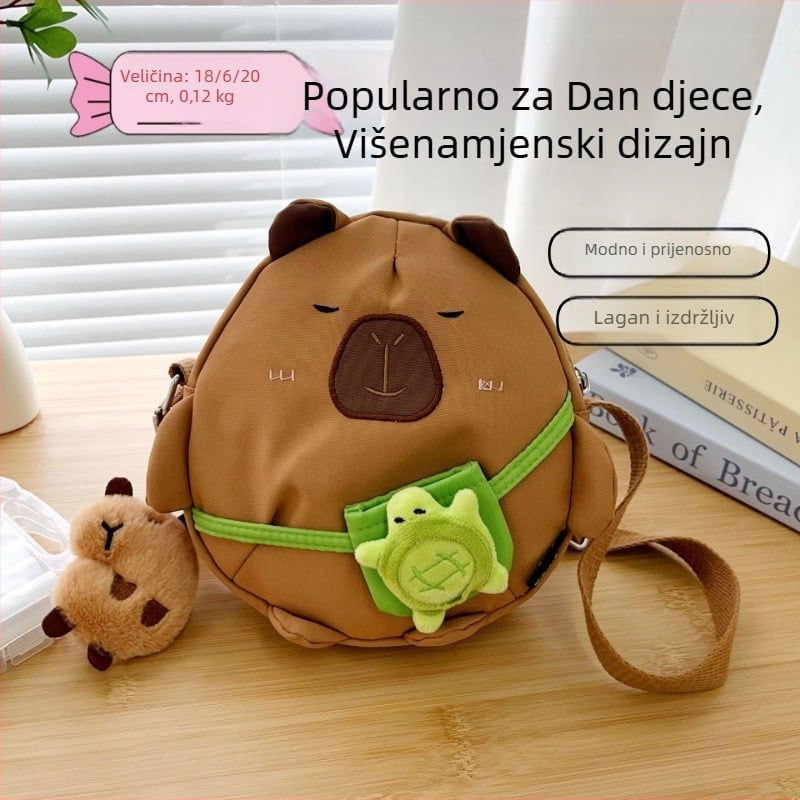 Capybara crossbody torba, najlon vanjski dio, poliester podstava, okrugli oblik, zatvarač, džep za telefon, jedna naramenica