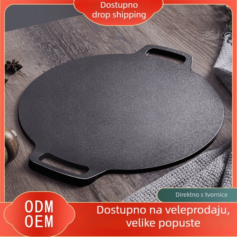 Palacinkarski tiganj od lijevanog željeza, debeo, bez poklopca, dubina 3 cm, s jednim dnom, pogodan za plinsku kuhinju.