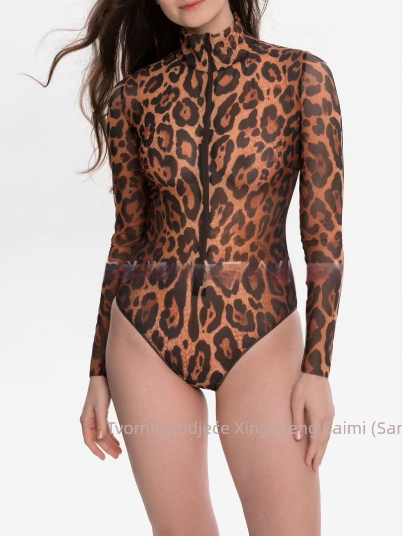 Jednodijelni kupaći kostim s leopard printom, dugi rukavi, s jastučićima za prsa, 85% poliester (15% podstava), bez čelične potpore