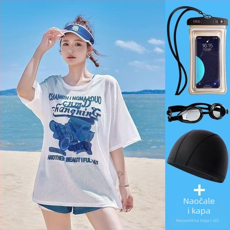 Ženski konzervativni kupaći kostim s tri dijela: odvojeni gornji dio uz labavi vanjski top, cvjetni uzorak, jastučić za prsa, tkanina poliester/nailon