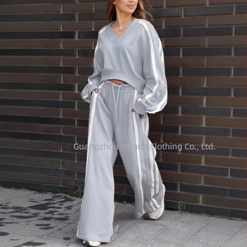 Dvodijelni casual kostim s V-izrezom i dugim rukavima, pulover i hlače, prugasti/pleteni mreža uzorak, Spandex tkanina, 90–95% Spandex, proljeće 2025, japansko-korejski ležerni stil