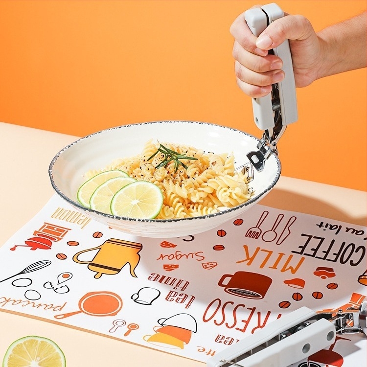 KOMEKI Višestruki klips protiv opeklina za vruće ploče; materijali: plastika, nehrđajući čelik, željezo