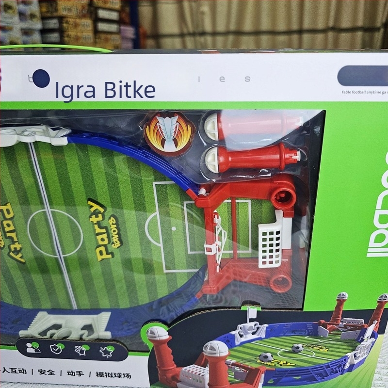 Dječji stolni nogomet – plastični stolni nogomet za dva igrača, natjecanje u nogometu i interakcija roditelj-dijete, za dob 7–14.