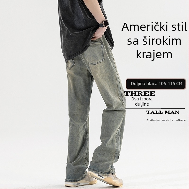 Traperice s blagim širenjem nogavica, srednji pojas, izblijedjeli pamučni denim, zatvarač, ukrasni džepovi