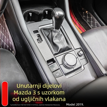 Unutarnje komponente Mazda3 (Axela): držač za čašu u središnjoj konzoli, okvir mjenjača, okvir stražnjeg otvora za ventilaciju