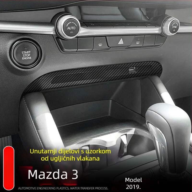 Unutarnje komponente Mazda3 (Axela): držač za čašu u središnjoj konzoli, okvir mjenjača, okvir stražnjeg otvora za ventilaciju