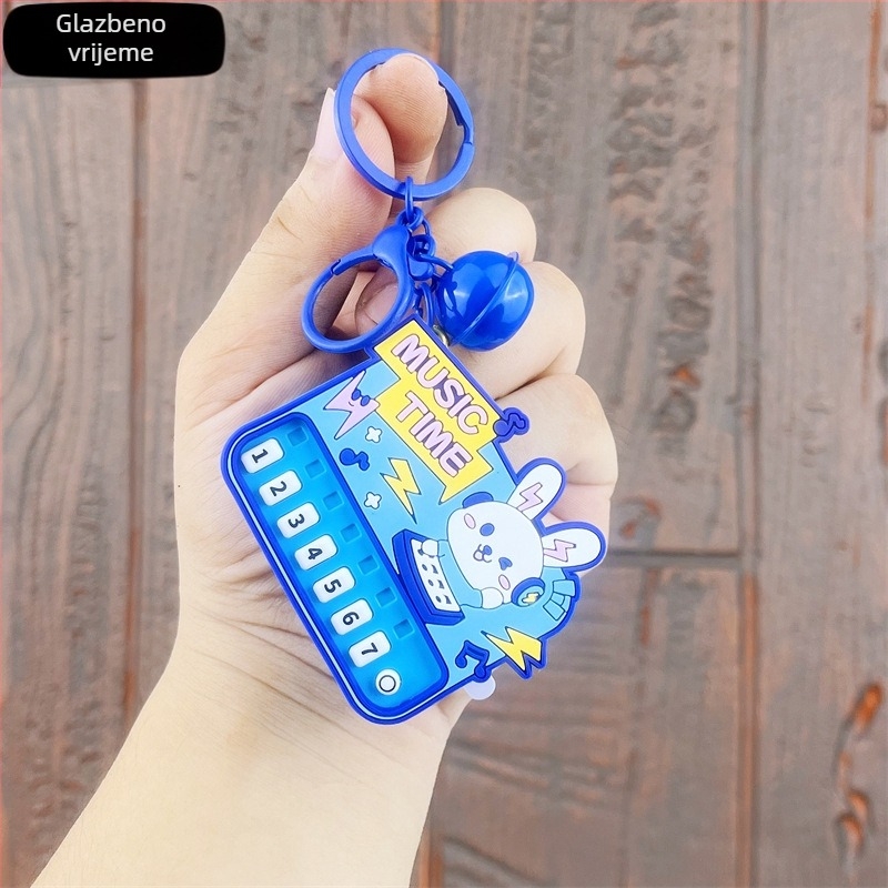 Mini klavirski privjesak sa svjetlom — edukativna prijenosna glazbena igračka od plastike